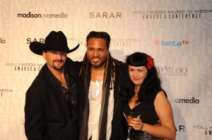 Coldwater Canyon Band frontman Howie Vaughn mingling with singer-songwriter Sharif Iman and rockabilly sensation Karling on the Red Carpet at the Hollywood Music In Media Awards on November 18 at The Highlands located in the Kodak Theater Complex/Hollywood & Highland Center.
