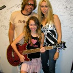 PHOTO CAPTION: Billy Ray Cyrus  and wife Tish  presented their daughter Miley  with a Daisy Rock Girl Guitar  during Cyrus' press conference at the CMA Music Festival  in Nashville on June 13th.  The 12 year old aspiring guitarist and actress ( Big Fish , PAX TV's Doc)  becomes one of the youngest "tweener" spokesperson's to endorse the one and only girl guitar company. (Photo courtesy of Luck Media & Marketing, Inc.)