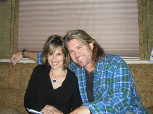 "Doc" TV star Billy Ray Cyrus is surprised by a visit from "Doc" actress Ruth Marshall (portrays Ms. Donna DeWitt on the show) backstage on his bus at the gig in Las Vegas.
