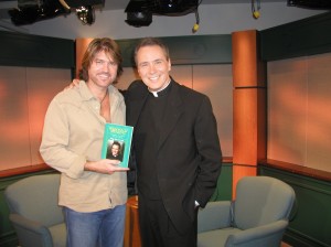 (L-R) are: Billy Ray Cyrus and host Rev. Monsignor James Lisante.