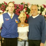Pictured Left To Right: Wal-Mart Store Manager Roger Johnson, Lorrie Morgan and Mike Martinovich on behalf of Image Entertainment